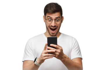 Young handsome man in white t-shirt, wearing round glasses, holding phone in hands, looking at screen with omg wow face