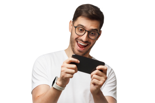 Young man in white t-shirt holding phone with both hands, moving it while playing video game in app
