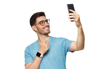 Young man in blue t-shirt with smartwatch on wrist, holding phone up and taking selfie portrait