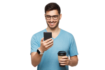 Young smiling guy in blue t-shirt and glasses, holding takeaway coffe cup, checking new messages in his smart phone