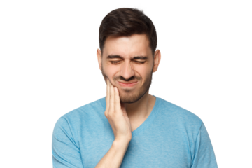 Young man with closed eyes suffering from severe toothache, touching jaw with fingers trying to ease strong tooth pain