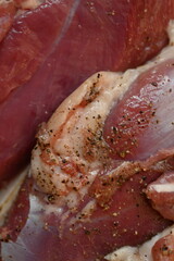 Texture of fatty fresh duck breast close up as background, texture of black meat of duck breast close up photo from above 