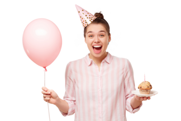 Young excited girl wearing birthday hat, holding balloon and plate with cake, feeling happy and satisfied with surprise