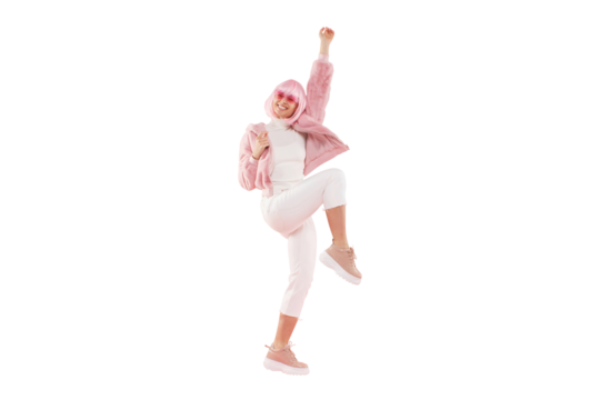 Full length portrait of energetic young woman wearing fur coat and colored glasses, jumping up at party