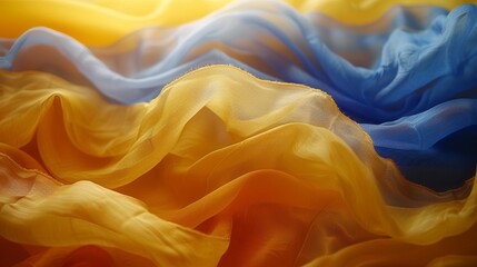 Obraz premium Flowing Blue And Orange Fabric, Abstract Background, Texture Of Blue And Yellow Smooth Elegant Tulle