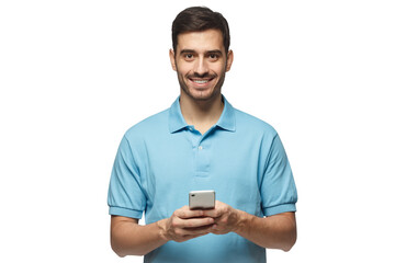 Young smiling man standing looking at camera, holding phone with both hands