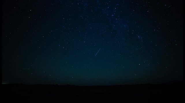 Time lapse of air traffic and stars in the night sky