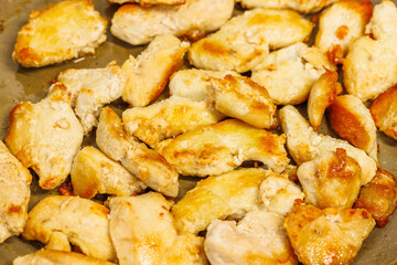 closeup full-frame background of roasting chicken breast white meat