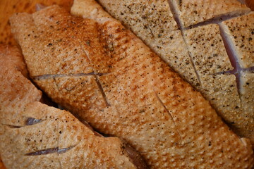  fresh duck breast with skin sliced for baking, top photo of duck breast skin texture as background, preparation for cooking, healthy home cooking, preparation for restaurant, 