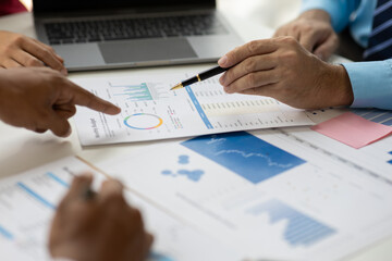 Meeting of business executive, consultant discussing analysis of the company financial situation and business planning with partner collaboration, consultation of strategy. Analyzing statistical data.