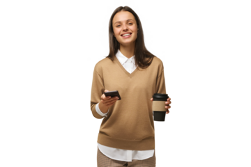 Indoor picture of young woman holding phone and coffee to go