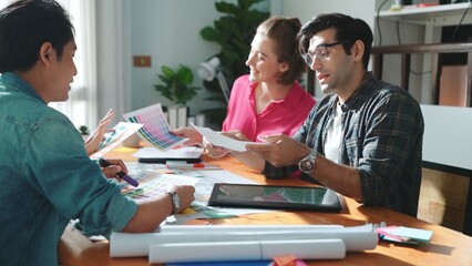 Top view of civil engineer discussing about house construction while planning about building design at meeting table with blueprint and architectural equipment. Design brainstorming idea. Symposium.