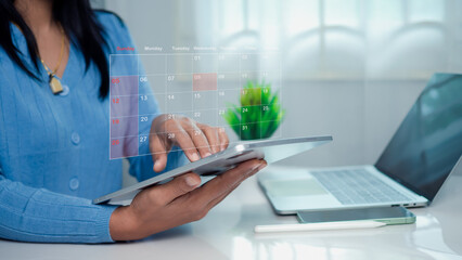 Businesswoman marking dates on virtual calendar with tablet, Managing his business schedule, Setting reminders for important appointments, creative collage for planning ideas, Appointment scheduler.
