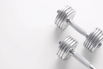 Chrome Dumbbells On White Background