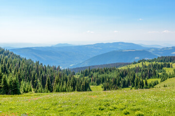 Beautiful landscape of valley in Alpine mountains, small trail, hike root, majestic picturesque view in sunny day