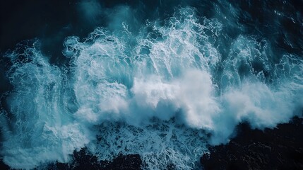 Obraz premium Powerful and Dramatic Ocean Wave Crashing Against Rocky Cliffs Symbolizing the Intense Force and Energy of Nature Along the Rugged Coastal Landscape
