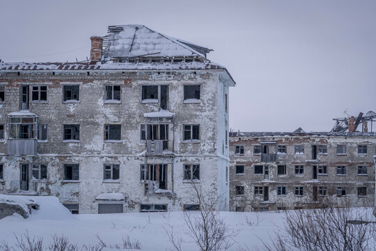 The abandoned apartment buildings in Vorkuta, Russia, during the cold snowy winter in Russian Arctic.
