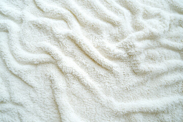 Fototapeta premium A soft, absorbent white terrycloth texture with looped cotton fibers, commonly used in towels and bathrobes