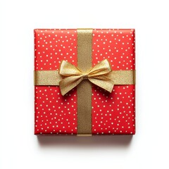 Isolated Christmas gift box with red wrapping paper and a golden ribbon, placed on a clean white background