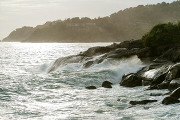 waves crashing on rocks