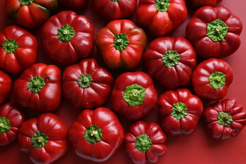 texture of red bell peppers as a background, autumn ripe juicy red bell peppers as a background, juicy organic food