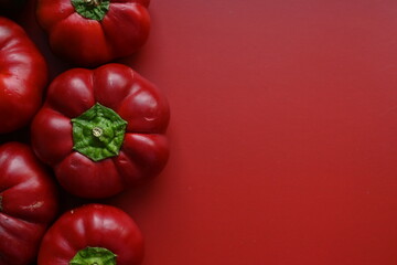 texture of red bell peppers as a background, autumn ripe juicy red bell peppers as a background, juicy organic food