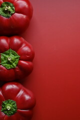 texture of red bell peppers as a background, autumn ripe juicy red bell peppers as a background, juicy organic food
