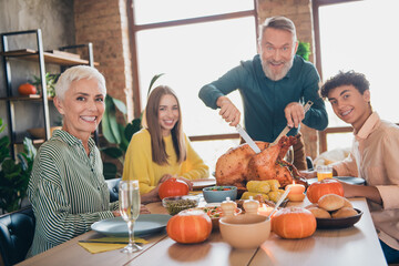 Portrait of big friendly family slice turkey good mood celebrate thanksgiving day dinner flat indoors