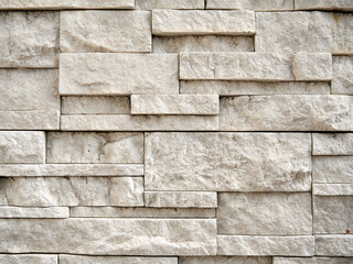 Background of stone wall texture. Stone wall background for design and decoration.