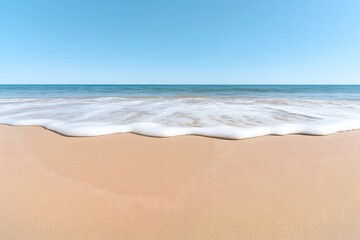 A Tranquil Beach Scene With Soft Waves Lapping Against the Shore, Footprints in the Sand, and a Clear Blue Sky, High Resolution Wallpaper or Background