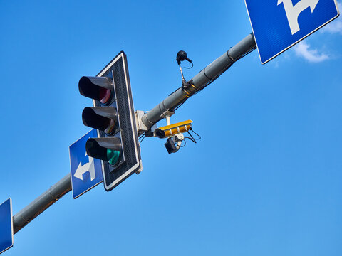 Traffic light with CCTV camera on the street