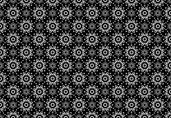 Abstract geometric pattern with lines, snowflakes. A seamless vector background. White and black texture. Graphic modern pattern.