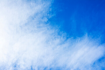 Bright blue sky with white cloud background. White cloud with vivid blue sky texture