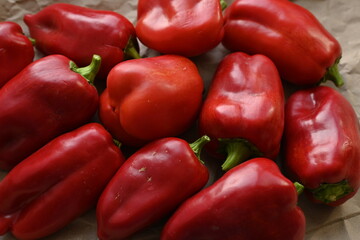 texture of red bell peppers as a background, autumn ripe juicy red bell peppers as a background, juicy organic food