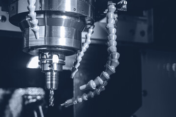 CNC milling machine, banner industrial metal work, blue toning.