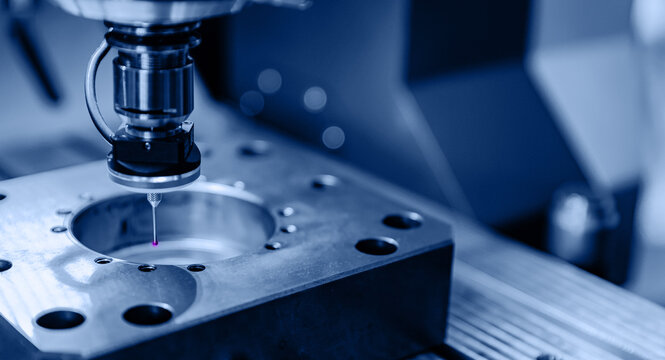 Quality control of drilling CMM in car engine. Milling CNC machinery with coordinate measuring machine for automotive parts industrial