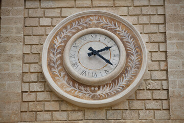 Fragment of the facade of the Cathedral Maria Santissima della Madia (Basilica Cattedrale Maria Santissima della Madia) in old town Monopoli, Puglia, Italy 