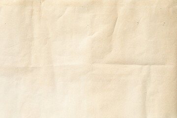 Crumpled Old yellow paper with folded crease