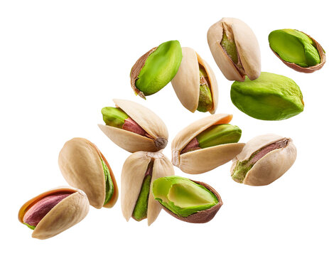 Pistachios nuts falling isolated on white background, cut out 