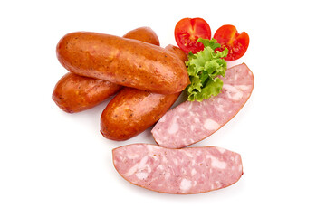 Smoked sausages with lettuce and tomato slices, isolated on white background.