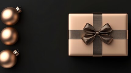 Elegant gift box with a bow and decorative ornaments on a dark background.