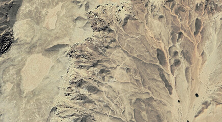 The landscape of the sandy desert in Qatar from a bird's eye view