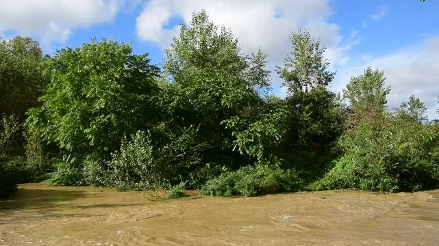 River in flood with flooding in Isere in France in autumn.