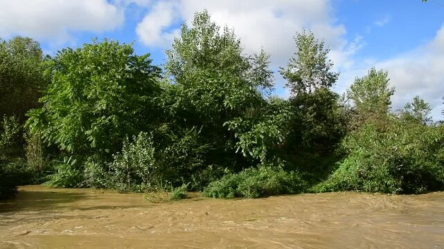 River in flood with flooding in Isere in France in autumn.