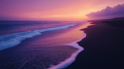 Fototapeta premium A Purple Sunset Casts a Glow Over a Tranquil Seascape and a Black Sand Beach