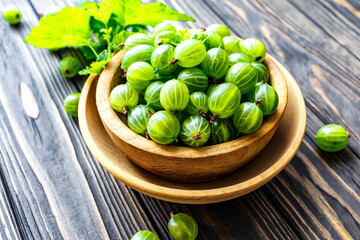 Green Organic Berries Gooseberries.Green gooseberries in a wooden bowl.Gooseberries on the wooden table. Harvest concept. Vegetarian food.