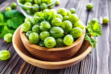 Green Organic Berries Gooseberries.Green gooseberries in a wooden bowl.Gooseberries on the wooden table. Harvest concept. Vegetarian food.