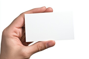 Obraz premium Close-up of a hand holding a blank white card, isolated on white background, perfect for business card mockups, identification concepts, or branding visuals
