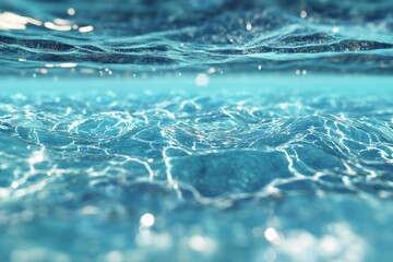 Craft a visually stunning close-up image of a crystal-clear blue ocean showcasing subtle ripples and reflections, portraying a sense of calm and serenity using CG 3D techniques.