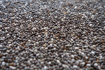 Raw soya beans background with blur effect close-up.